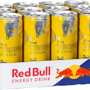 Red Bull Tropical Edition (Yellow Edition) in a bright yellow can with tropical fruit graphics, condensation on the can, ice cubes and fresh pineapple slices, dynamic energy burst background – exotic refreshment for body and mind